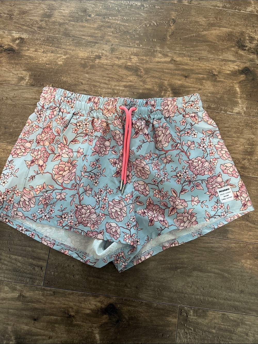 Mosmann Australia Pink Floral Athletic Drawstring Shorts on Light Blue